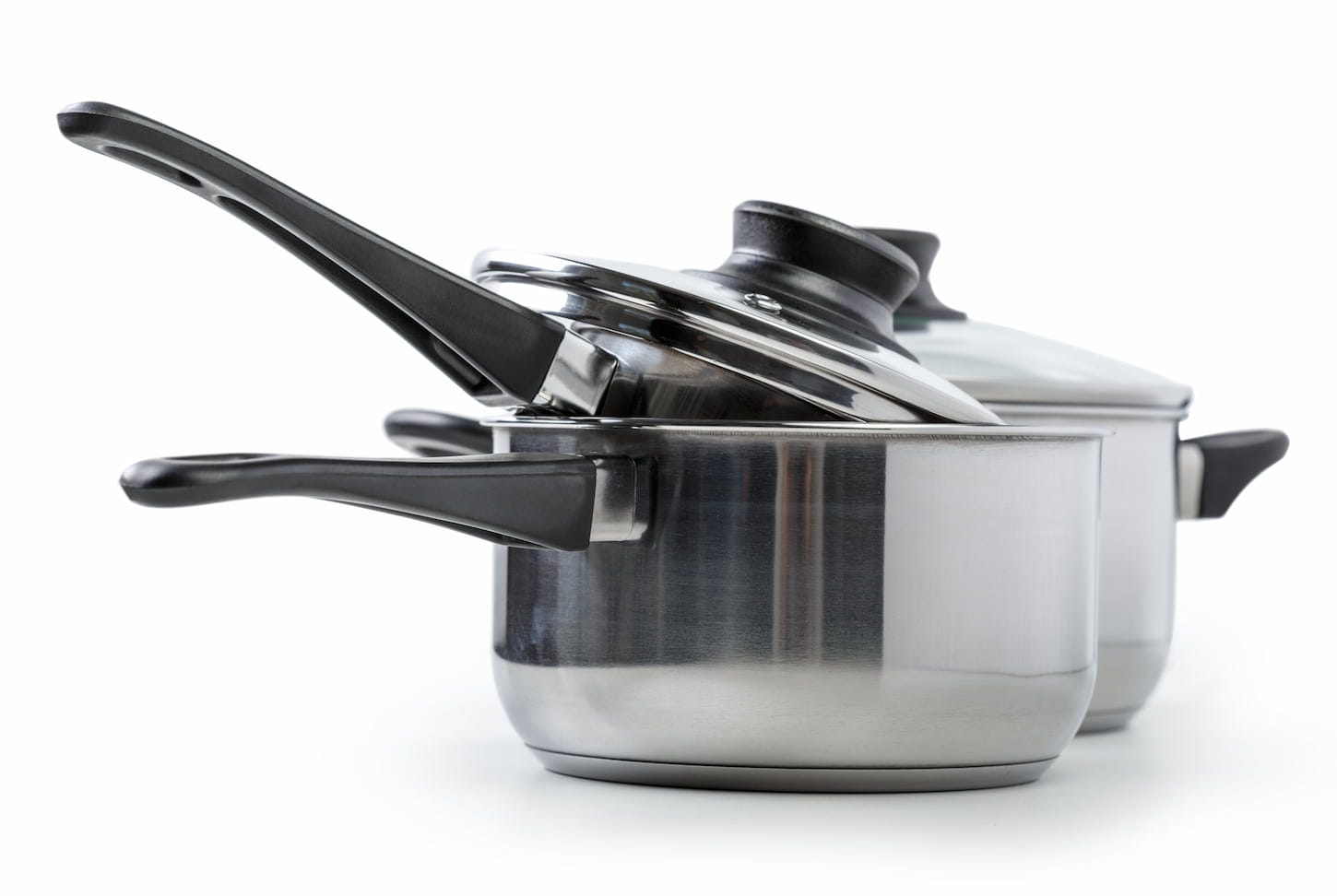 An image of Stainless steel pots and pans isolated on white background.