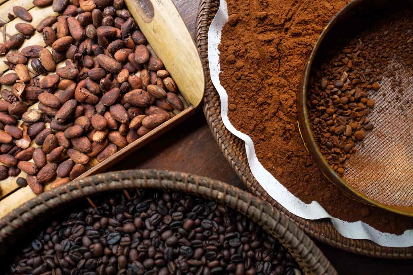 An image of different types of coffee beans on the plates.